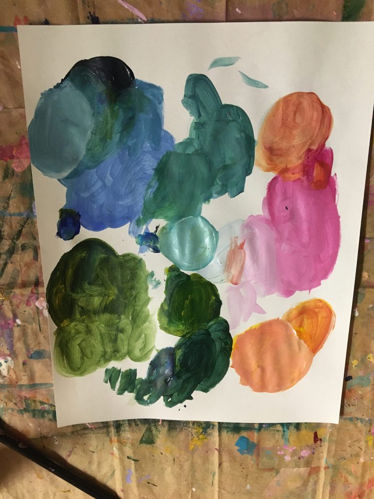 painting swatches of colors for a collage project
