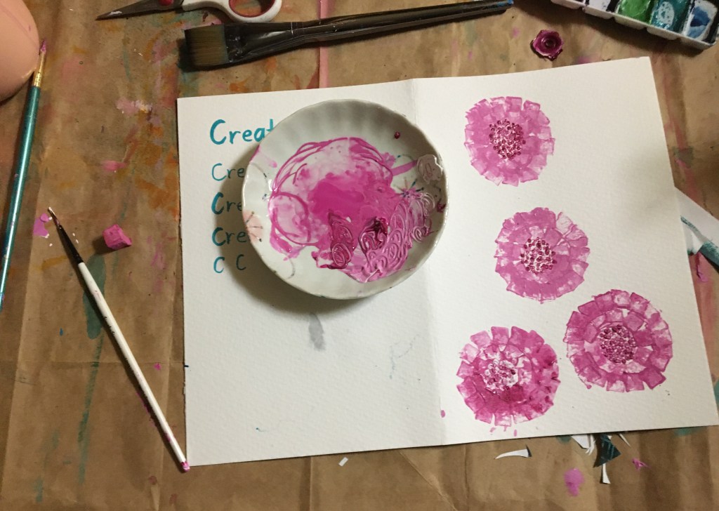 monotone pink flowers made with an eraser stamp