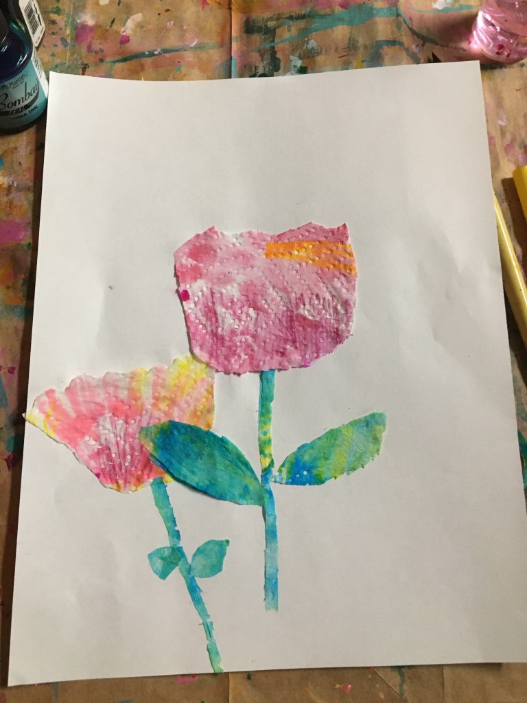 two flowers made from watercolor and a napkin