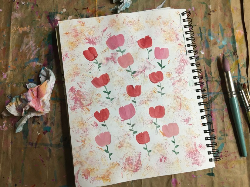 pink flower pattern on textured paper.