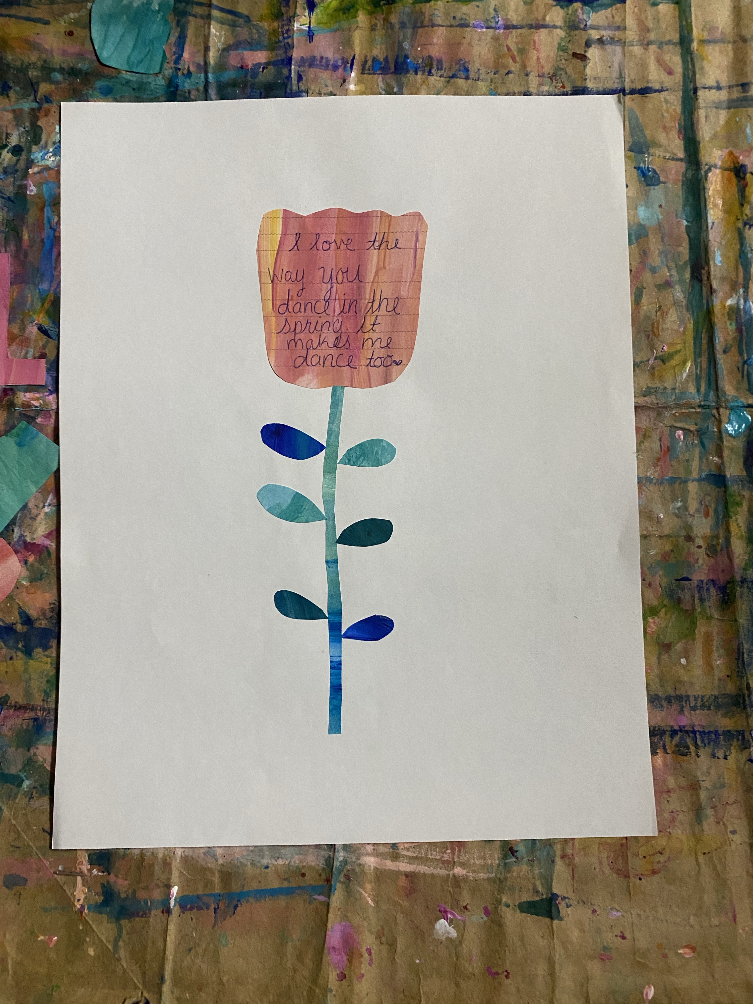 a pink and orange strokes flower with a quote about dancing in the spring