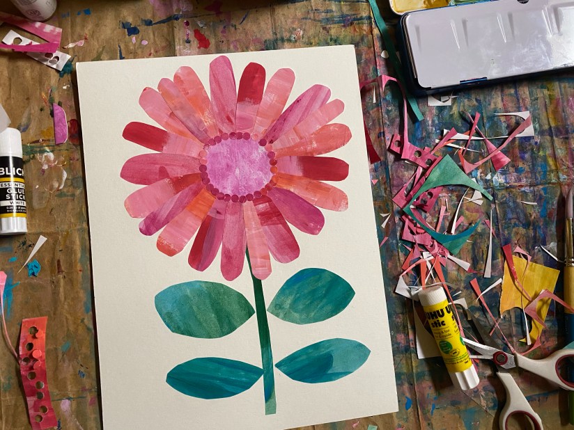 A large flower made from various tones of pink