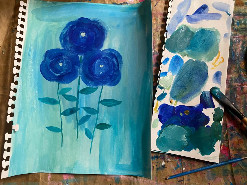 The blue roses with a white heart center.