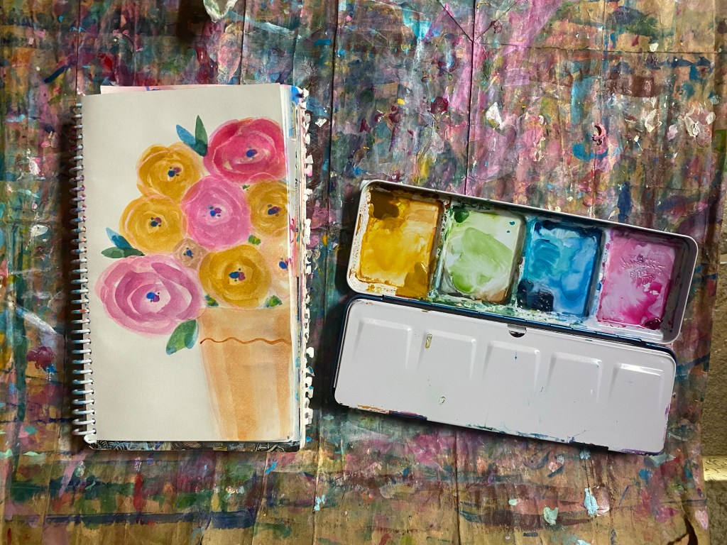 Watercolor painting of a yellow ochre vase with yellow, pink and orange watercolor flowers