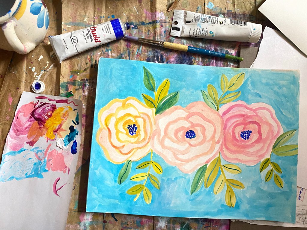 Three pink and red roses