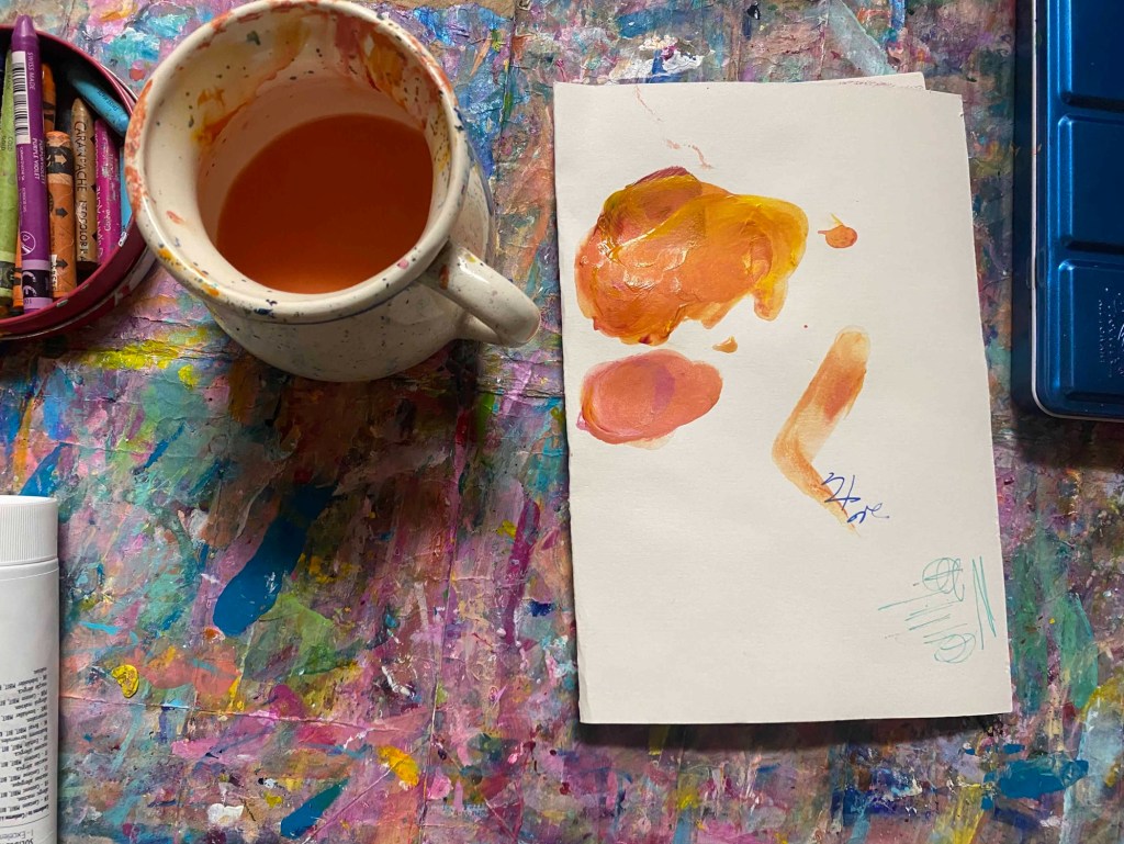 Finger Painting with Orange&nbsp;Paint