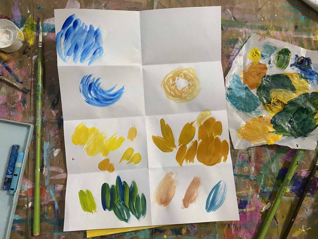 Practicing brush strokes and mixing yellow for Van Gogh sunflowers